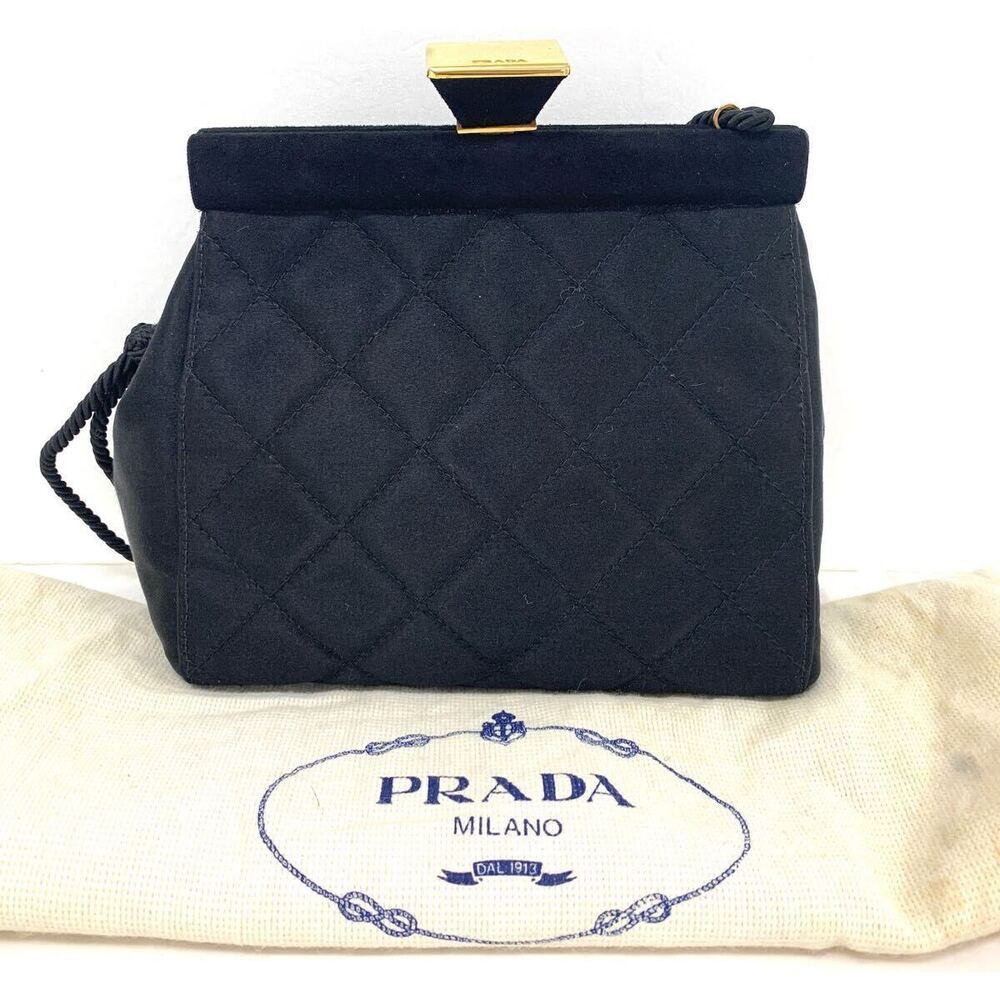 PRADA black quilted Milano handbag distinctive goldtone top clasp